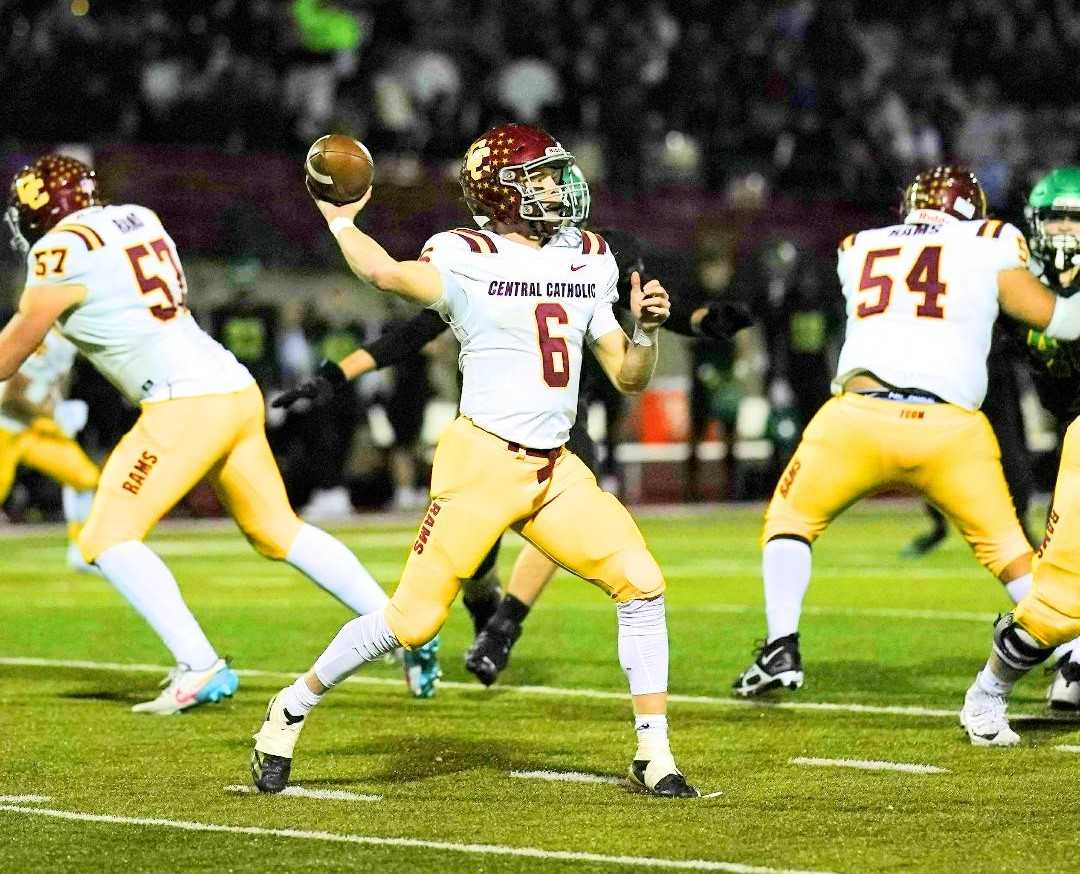Central Catholic quarterback Cru Newman ran for 101 yards and passed for 167 yards in Friday's win. (Photo by Jon Olson)