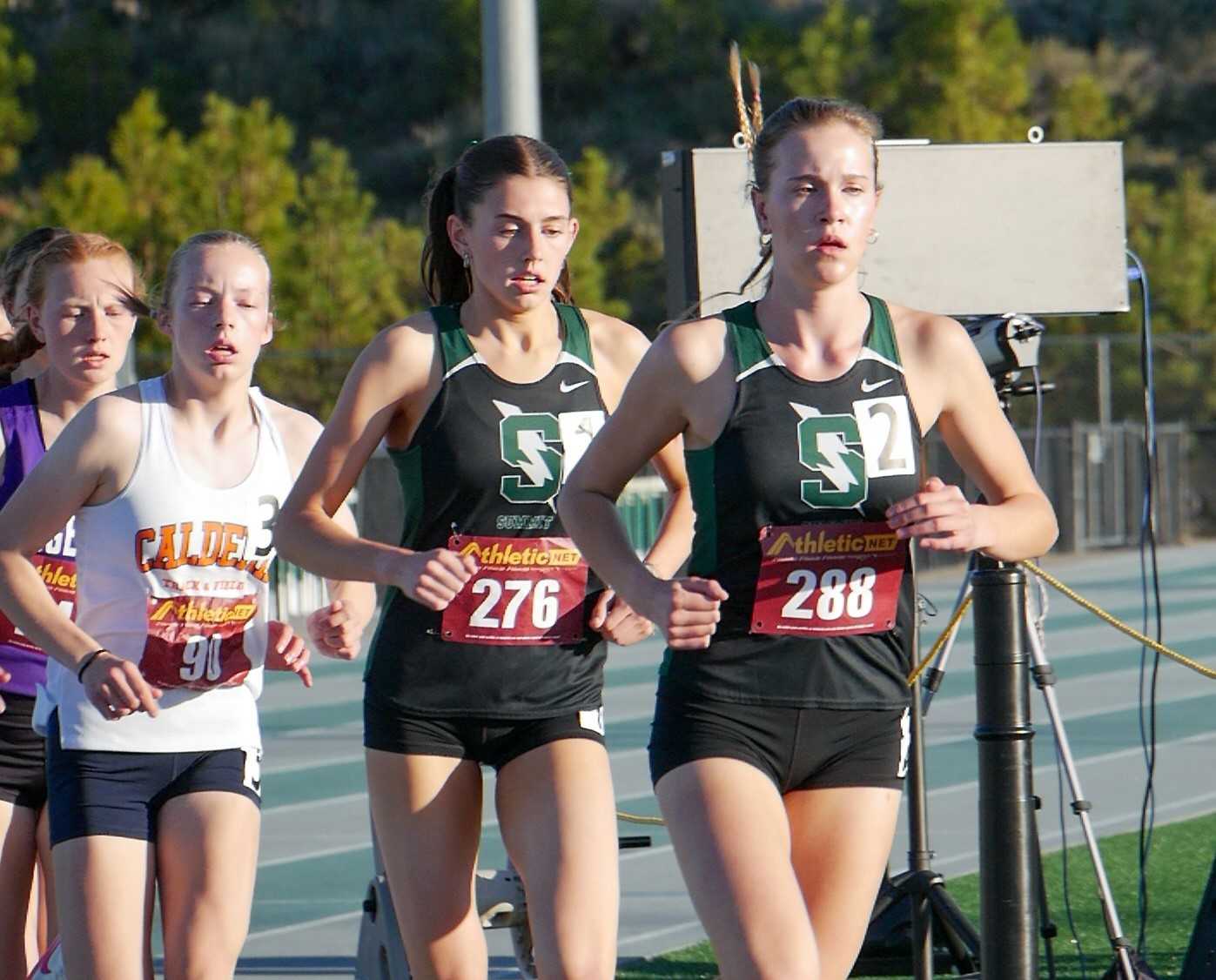 Juniors Skye Knox (288) and Sophia Capozzi (276) lead an experienced Summit distance crew. (Photo by Aaden Eggert)