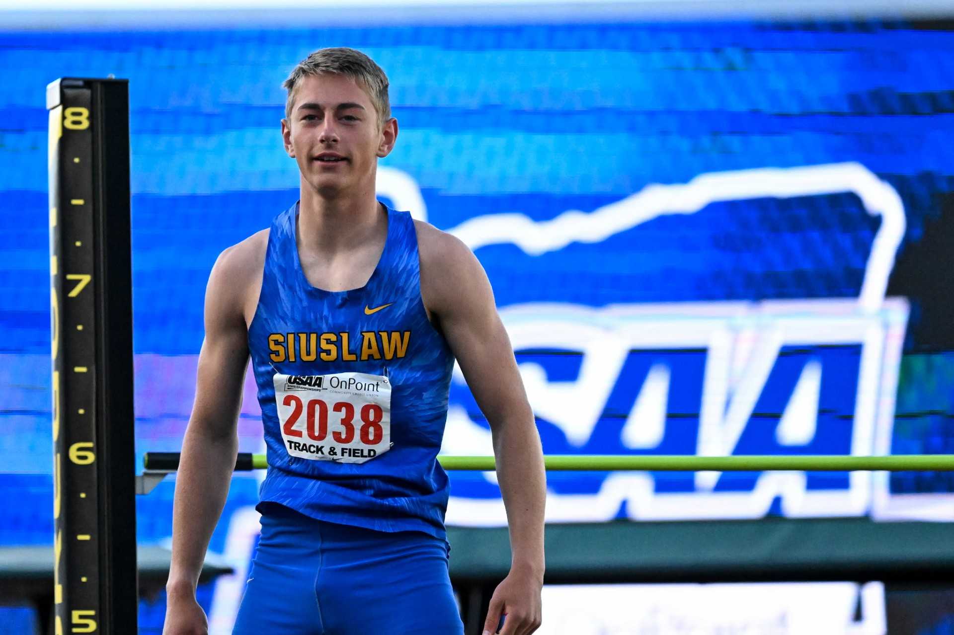 Siuslaw junior Kale Jensen placed first in the high jump and pole vault in the Mondo decathlon. (Photo by Becky Holbrook)