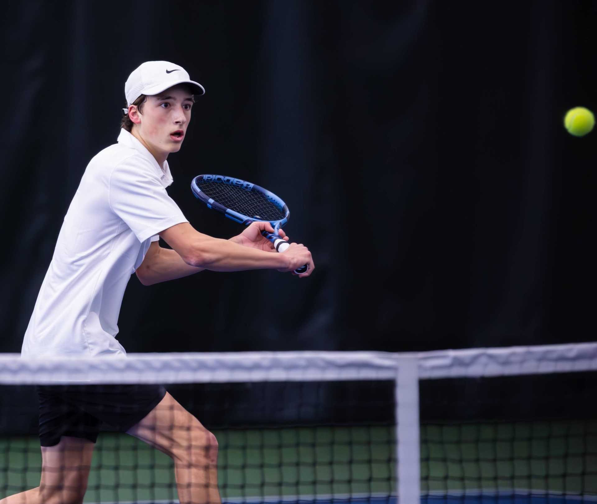 Lincoln's Cayden Laughton, a five-star prospect, trains at Oregon Elite Tennis under Jonathan Stark. (Photo by Sarah Quist)