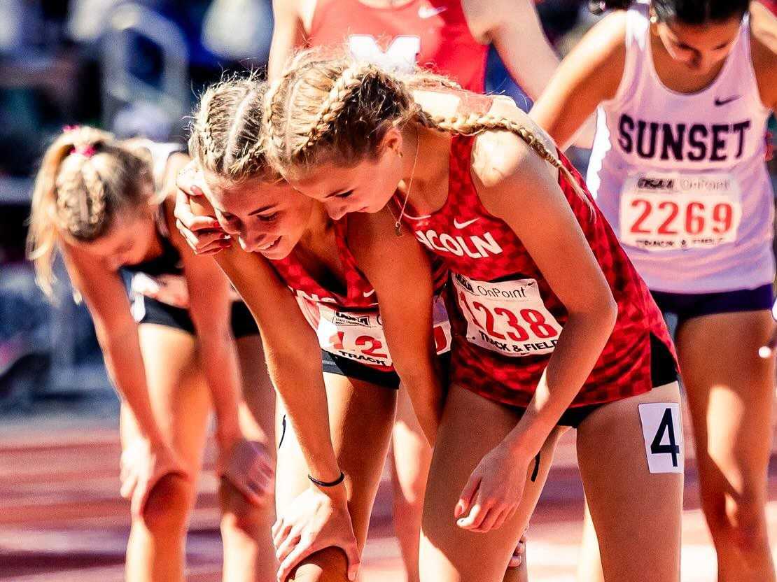 Lincoln's Sophia Malinoski (left) and Ellery Lincoln (right) lead the state in the 800 meters this season. (Photo by Jon Rhodes)