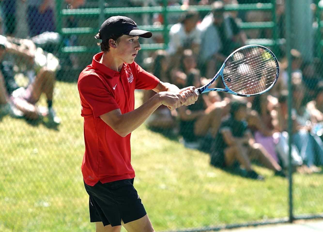 Lincoln freshman Cayden Laughton volleys against Mountainside's Arnav Arora in the 6A boys singles final. (Photo by JR Olson)