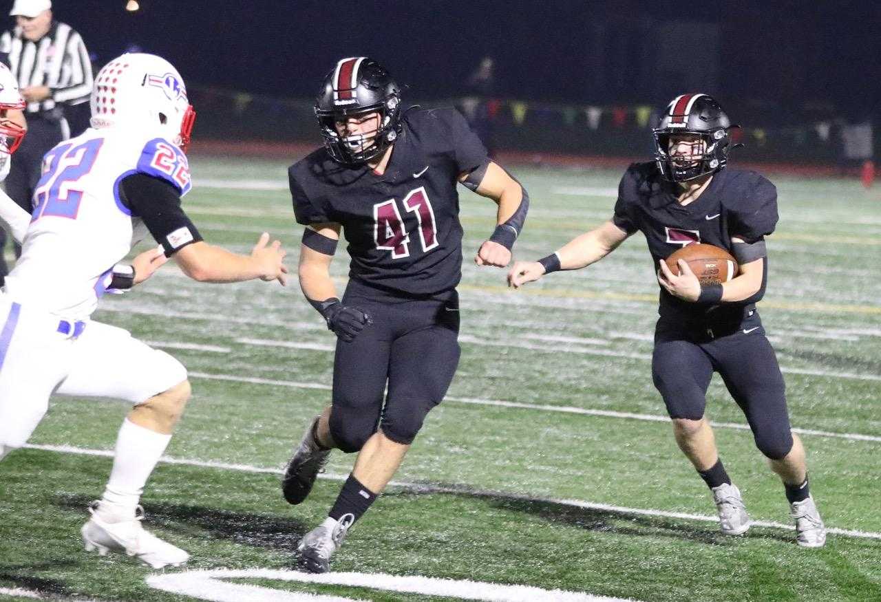 Glencoe's Daniel Heninger (7), running behind fullback Lincoln Kemper (41), rushed for 1,971 yards in 2024. (Norm Maves Jr.)