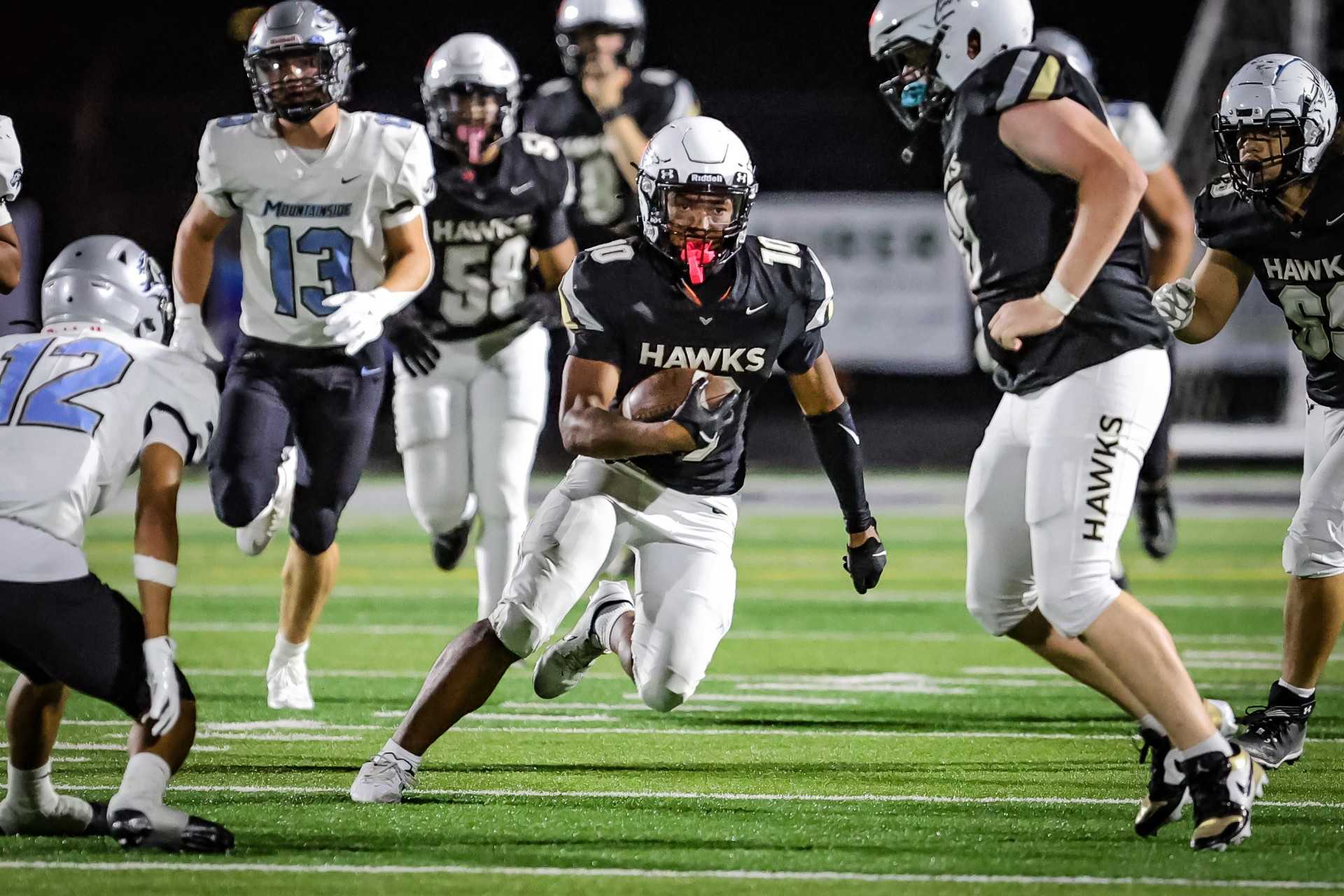 Nelson sophomore Jalen Chricton-Dale darts through the Mountainside defense in Friday's nonleague win. (Photo by Ryan Fanger)