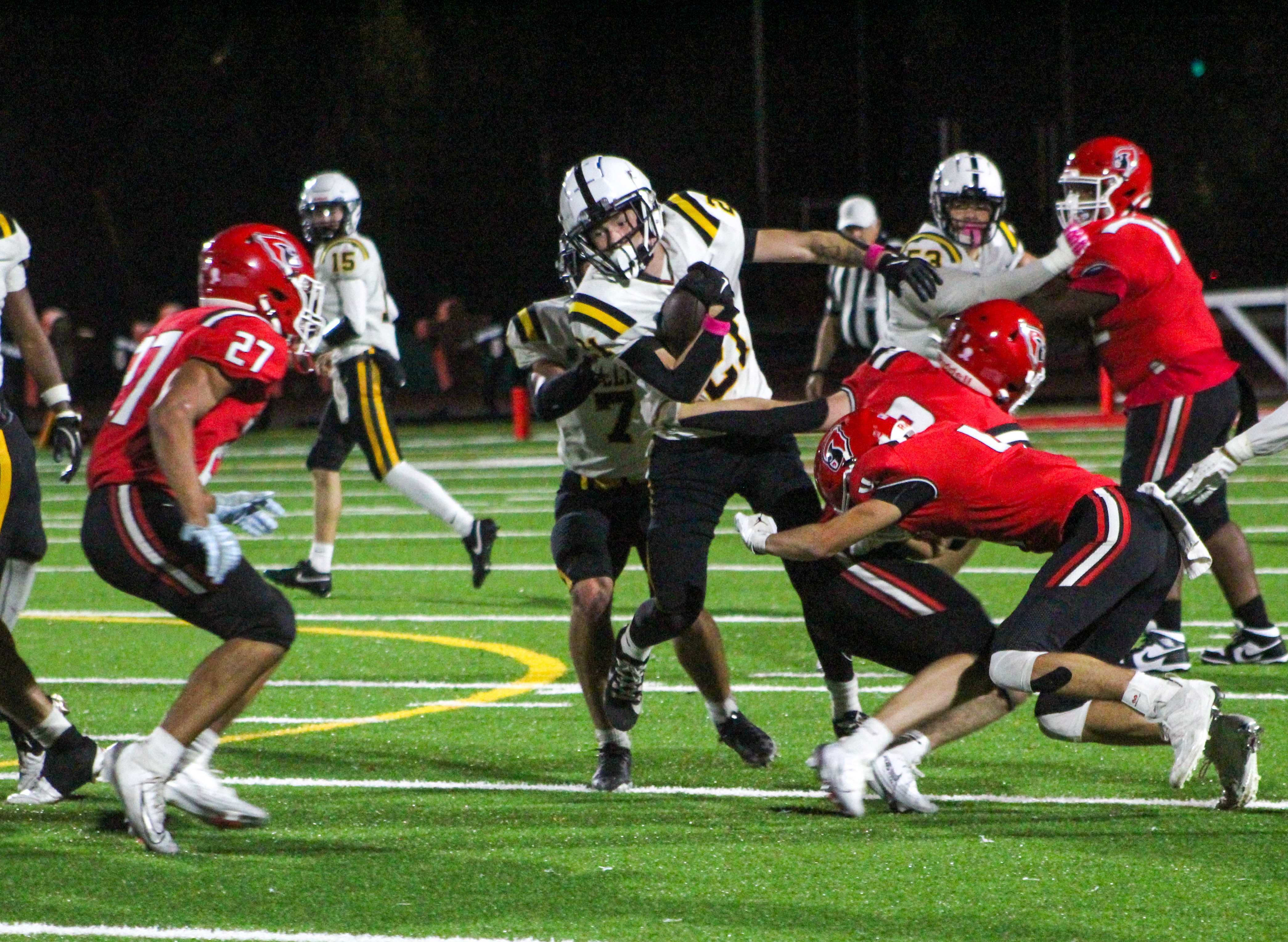 Roosevelt's Jay Jay Buell Jr. spins out of tackle against Lincoln. (Photo by Austin White/Portland Preps)