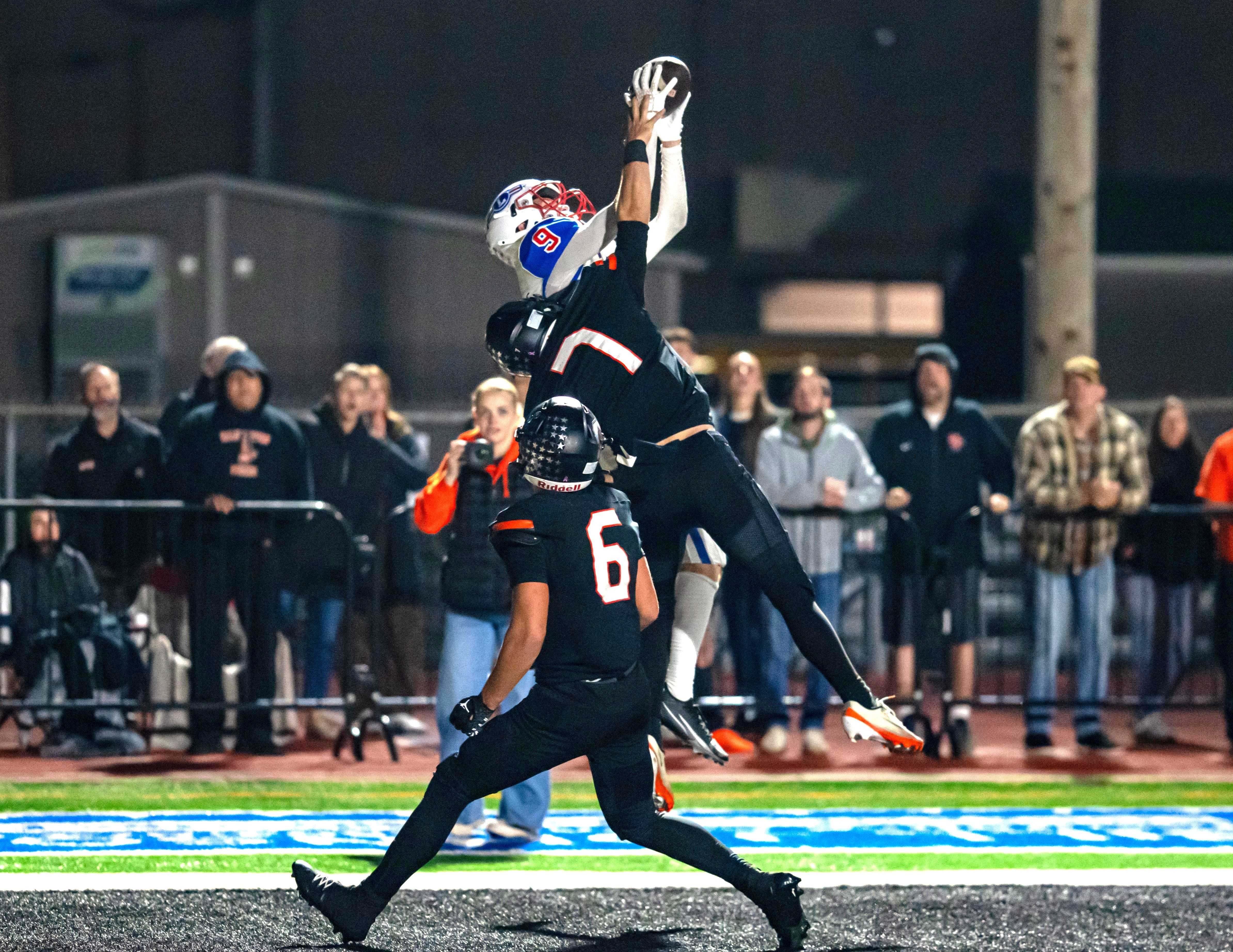 Lebanon's Logan Large rises up to catch the game-winning touchdown in the final seconds at Silverton. (Courtesy Lebanon HS)