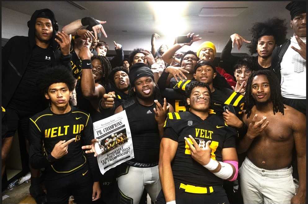 Roosevelt players celebrate their Portland Interscholastic League football title Thursday night. (Ben Teese/Portland Preps)