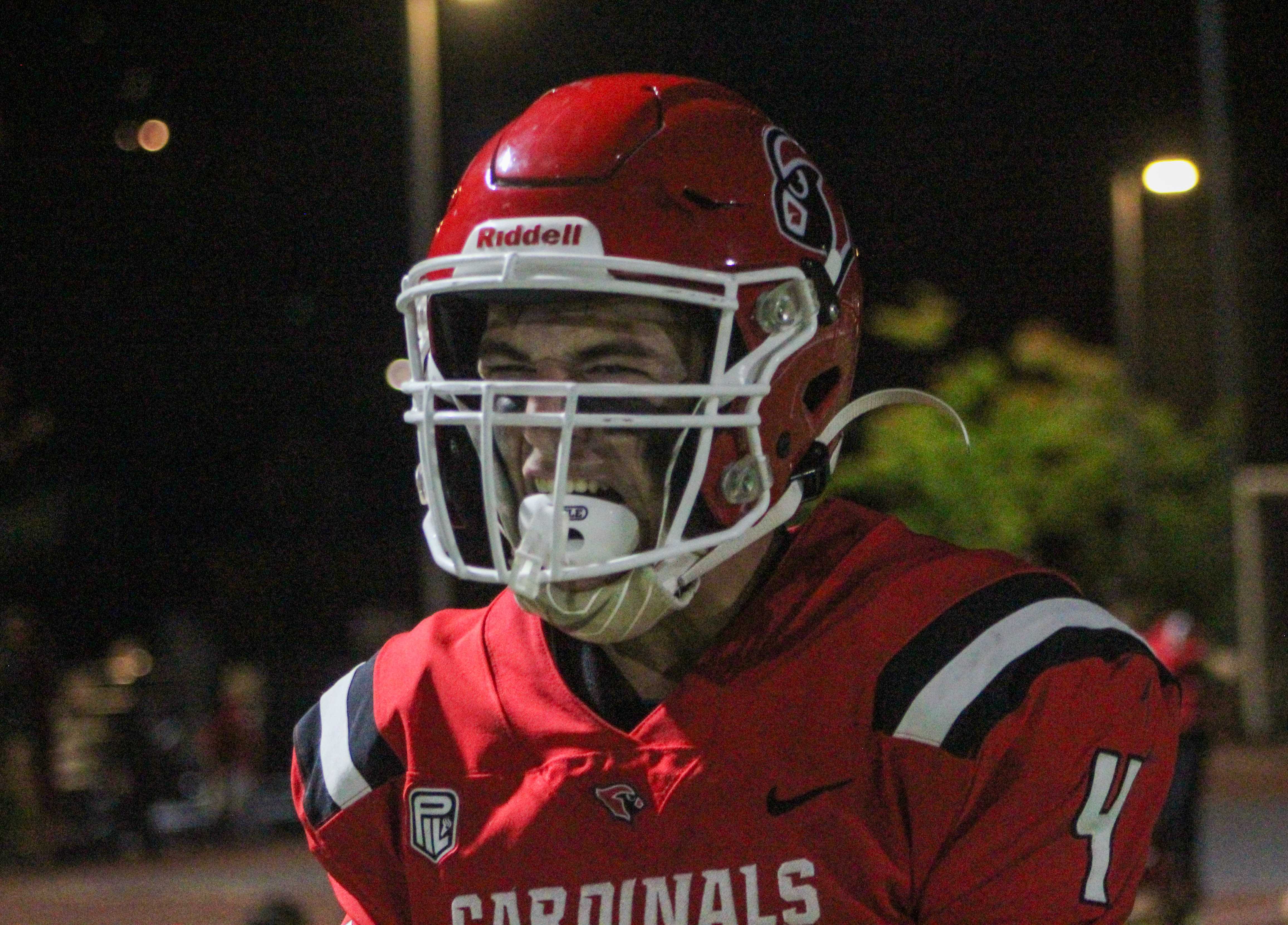 Lincoln's Reed Eldridge celebrates after an interception against Roosevelt. (Photo by Austin White)