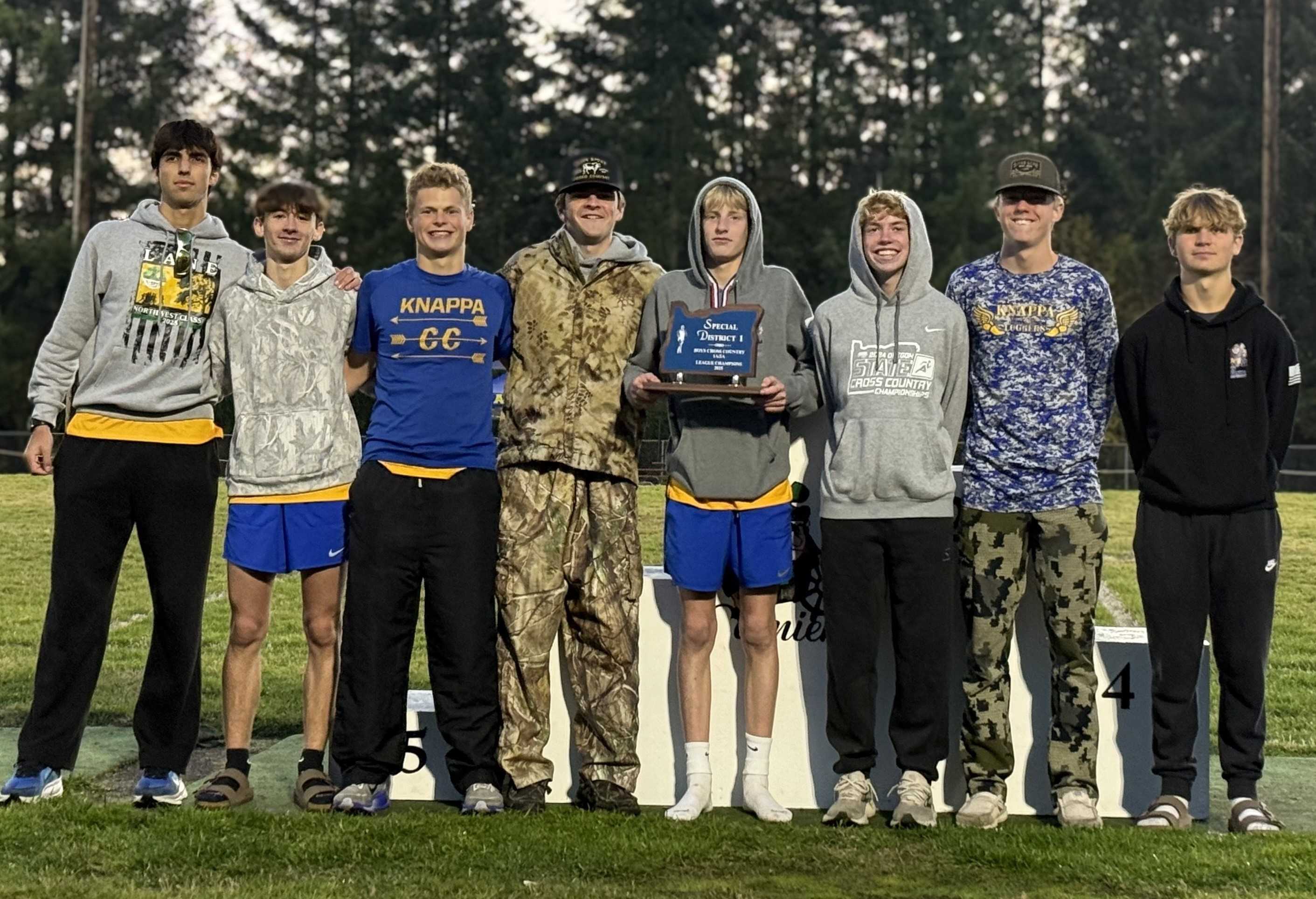 Knappa celebrates its title in last week's 2A/1A District 1 championships. (Photo courtesy Amanda Isom)