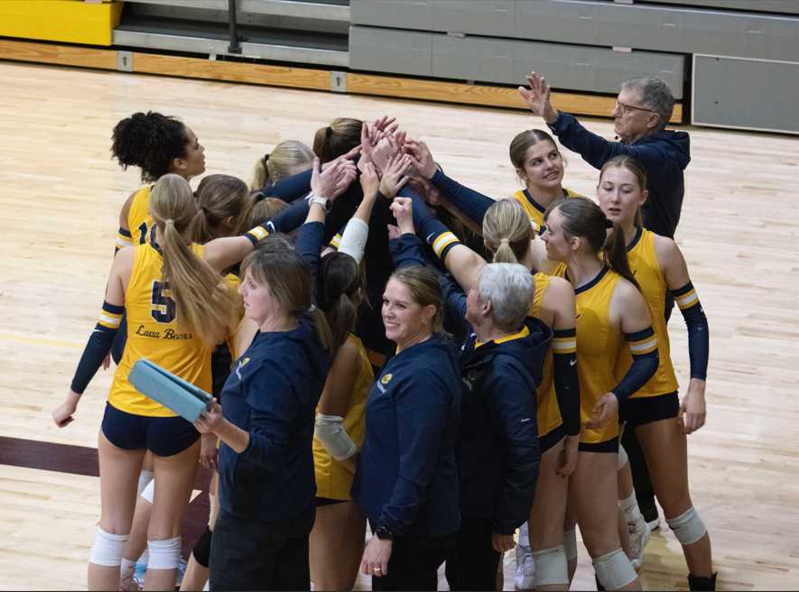 Bend girls volleyball breaks the huddle in the semifinal match against Crescent Valley. (Photo by Chris Burkhardt)