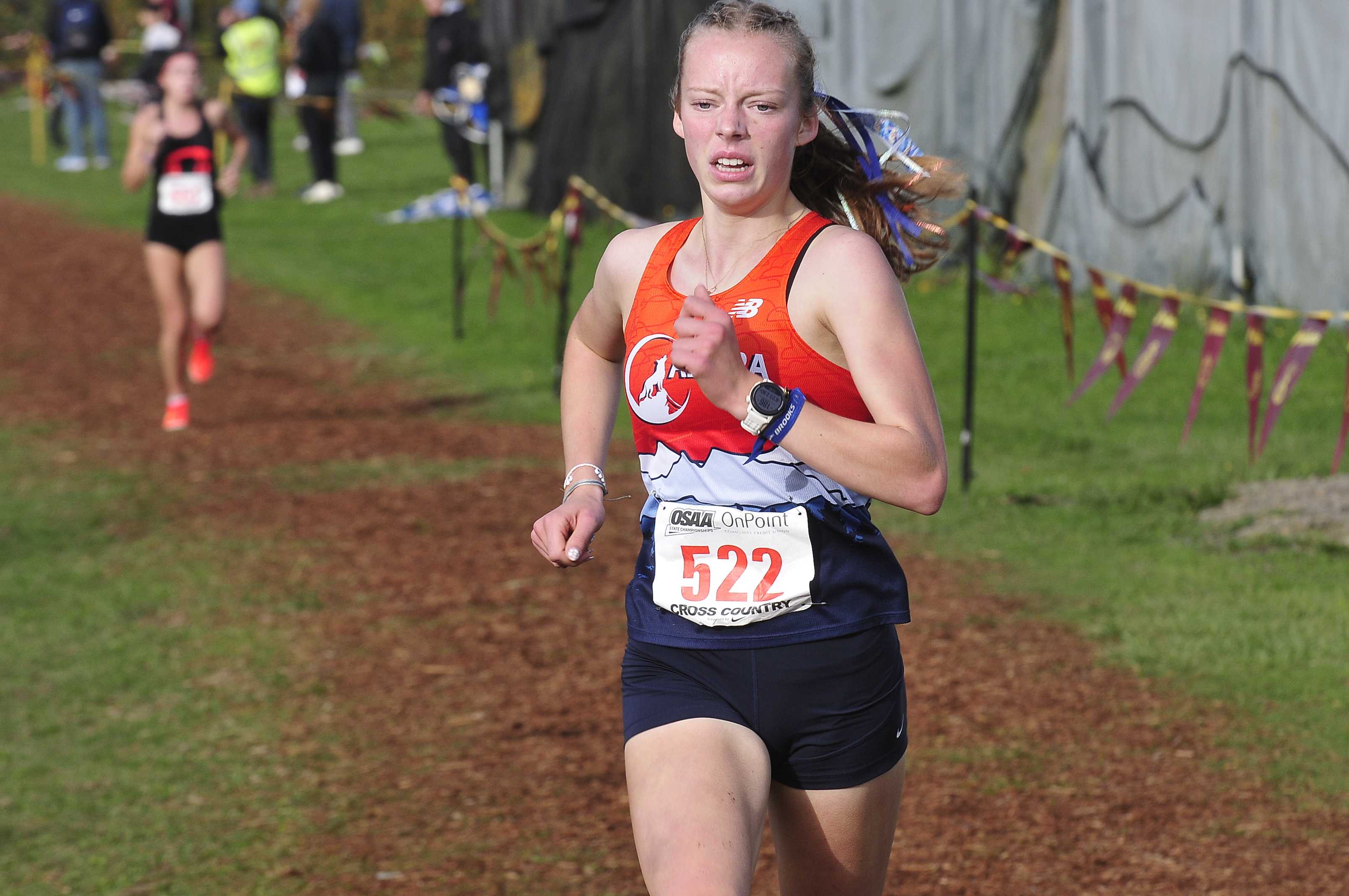 Maddie Carney became Caldera's first state champion in cross country Saturday. (Photo by John Gunther)