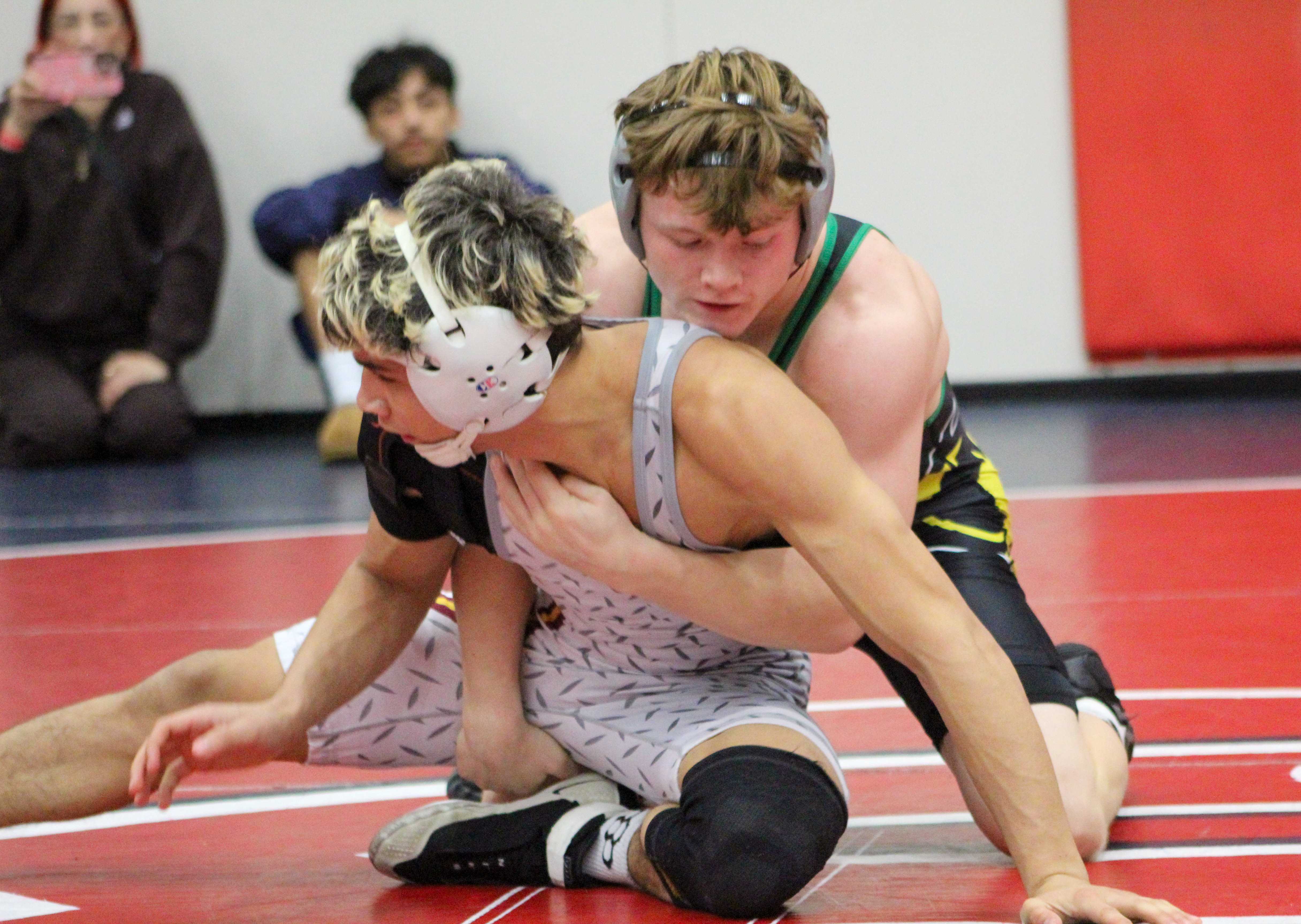 Sweet Home junior Jesse Landtroop, back, competes in the Rose City Championship final. (Photo by Austin White)