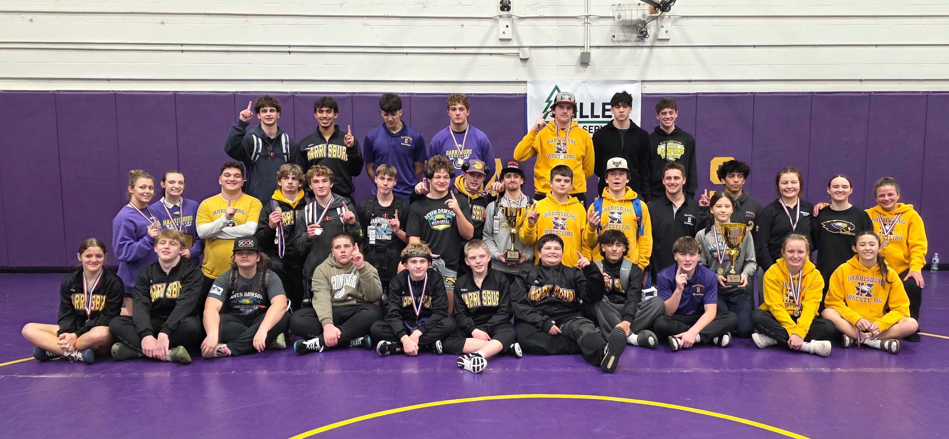 The Harrisburg wrestling team hopes to win both the boys and girls state title in 2026. (Courtesy photo Desmond Bennett)