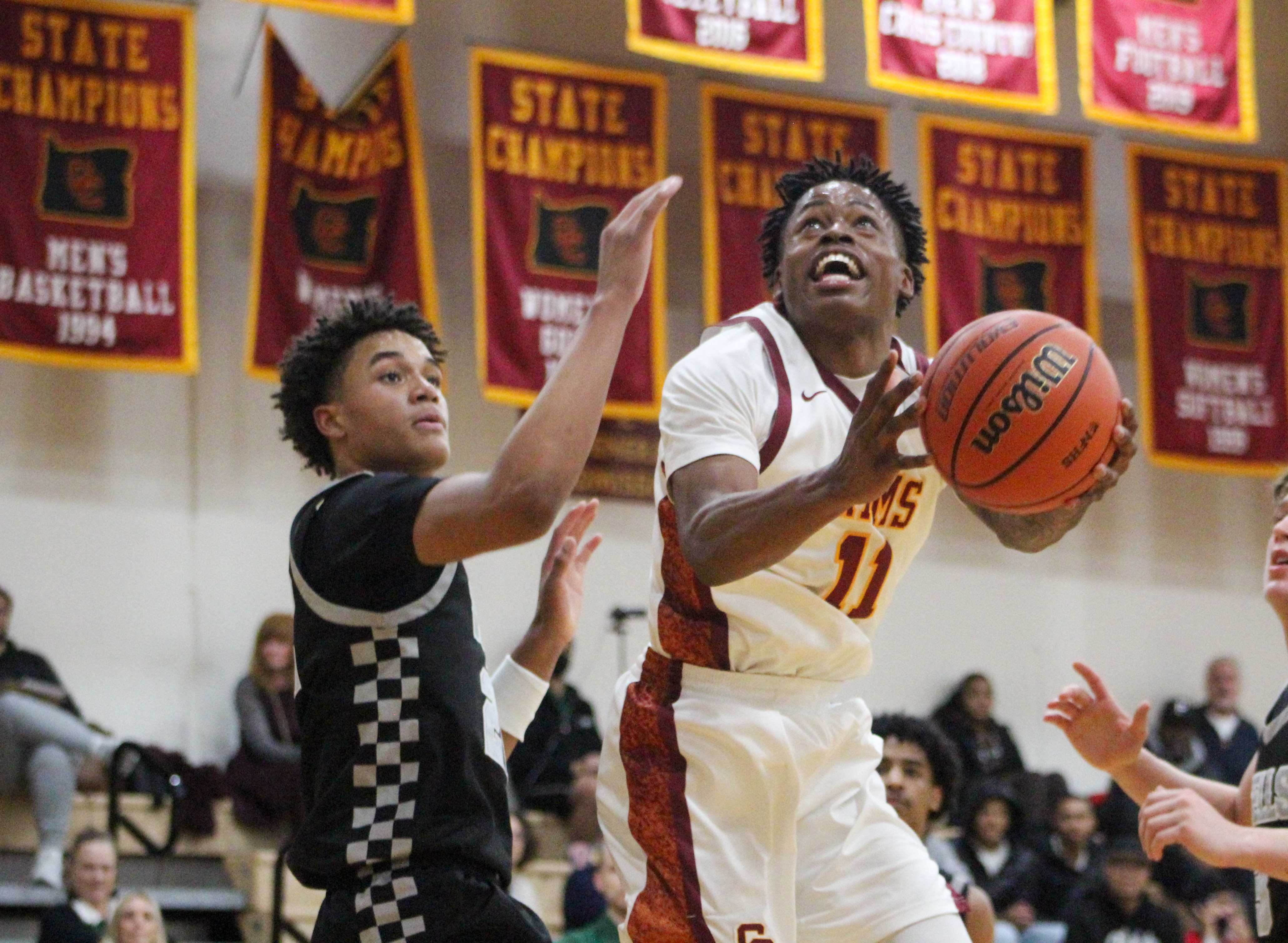 Central Catholic senior point guard Zamir 'Bam' Paschal is leading a balanced attack this season. (Photo by Austin White)