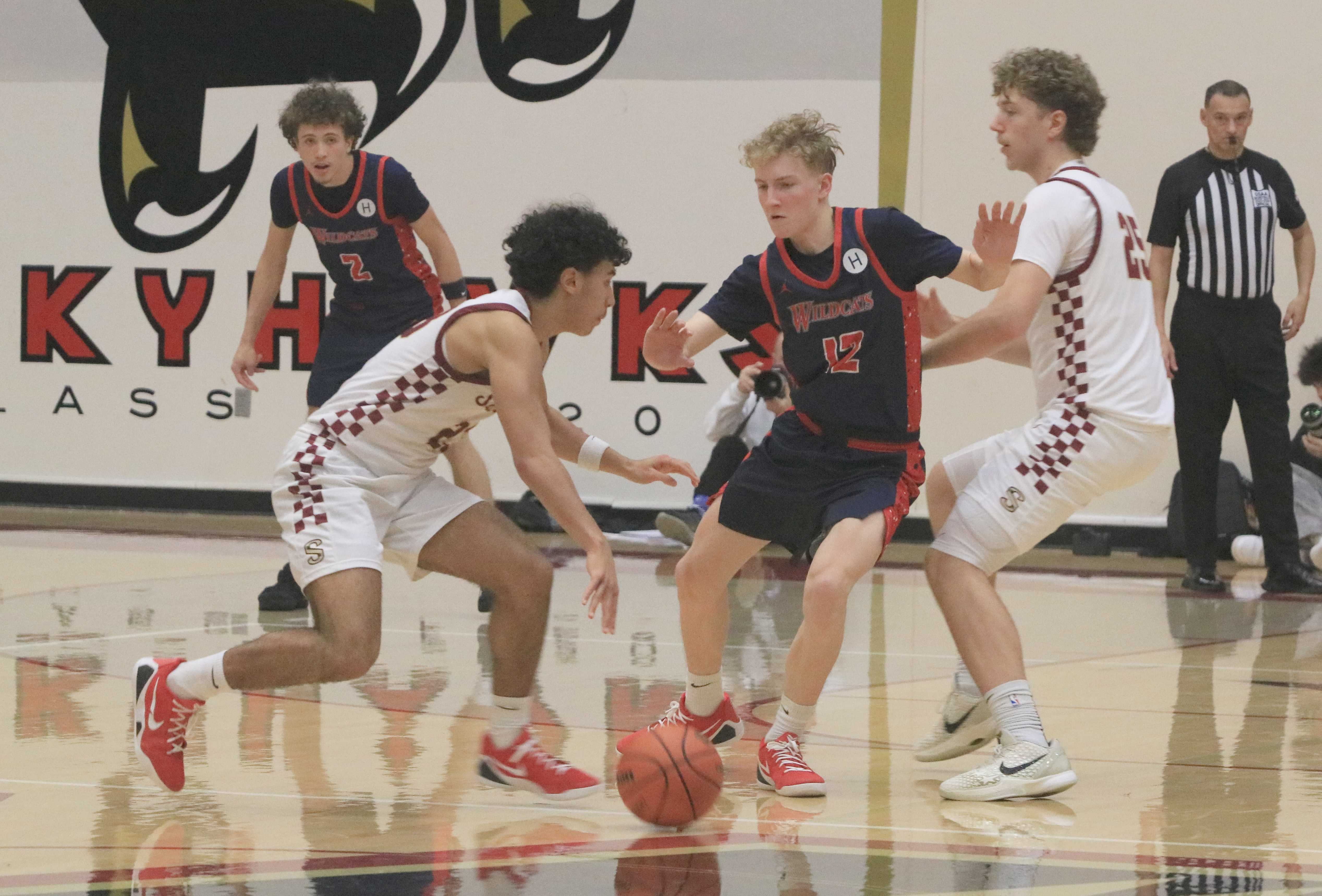 Southridge's Elijah Thompson (with ball) draws pressure from Westview's Landen Shelley during Friday's Metro League showdown.