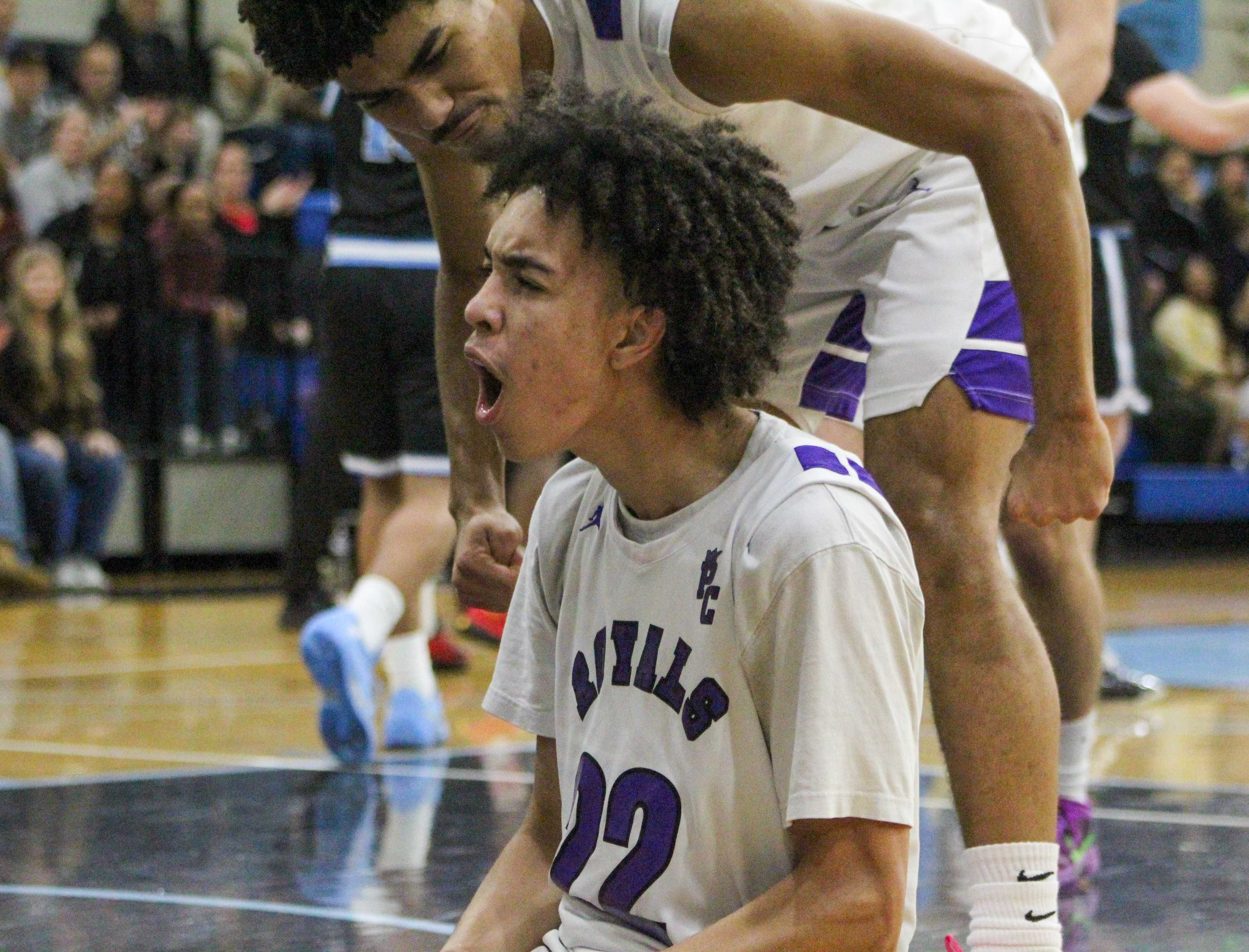 Portland Christian's Zane Ozier reacts after a made bucket. (Photo by Austin White/Portland Preps)