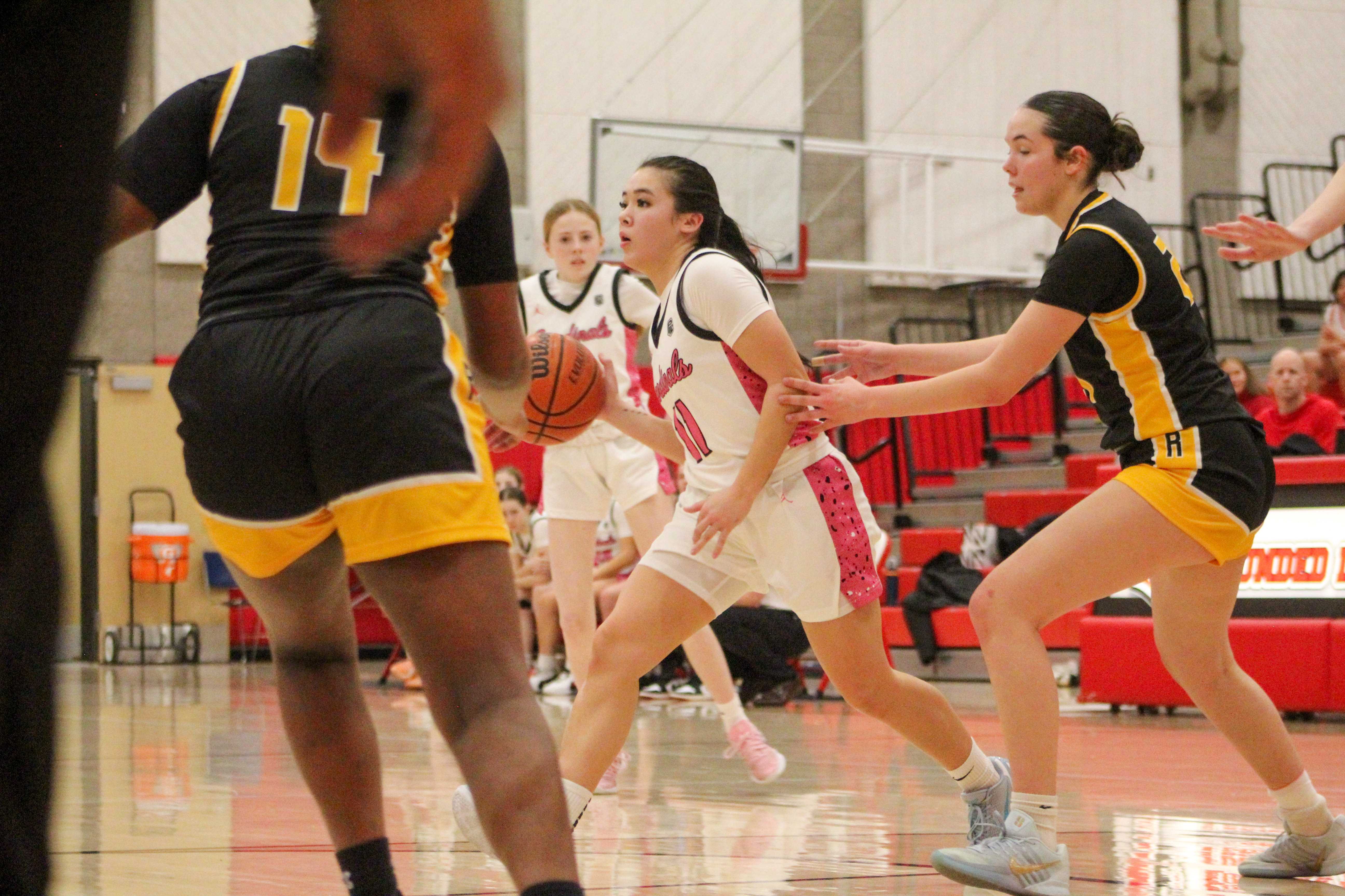 Lincoln senior Siri Lindsey makes a pass against Roosevelt. (Photo by Austin White/Portland Preps)