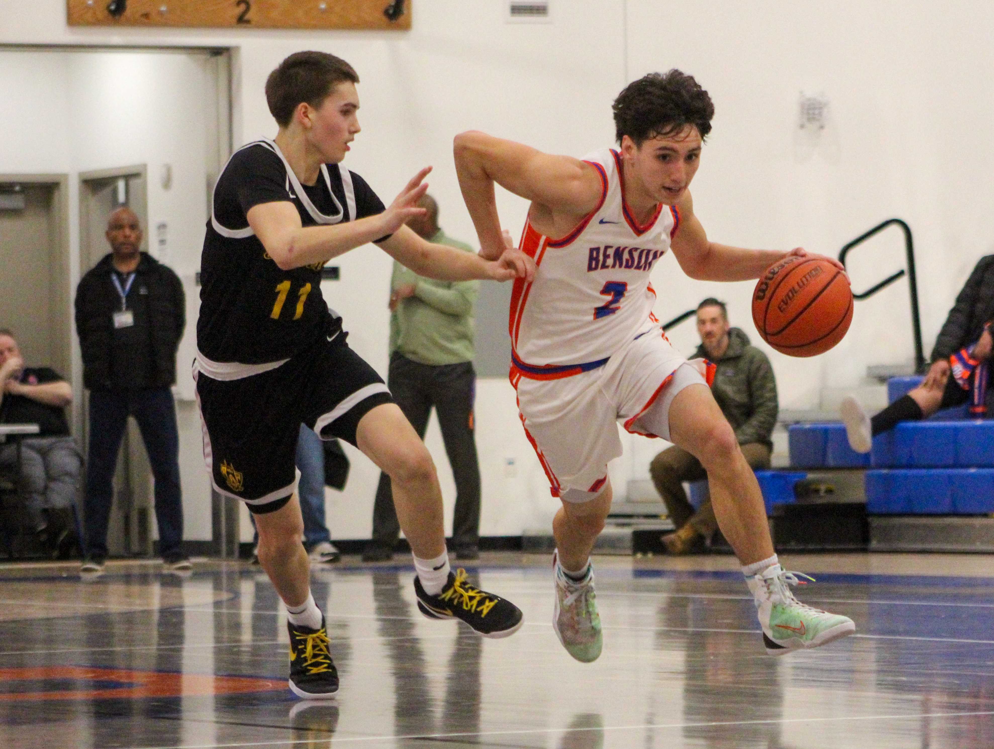 Benson senior Dache Acelar races up court against Roosevelt. (Photo by Austin White/Portland Preps)