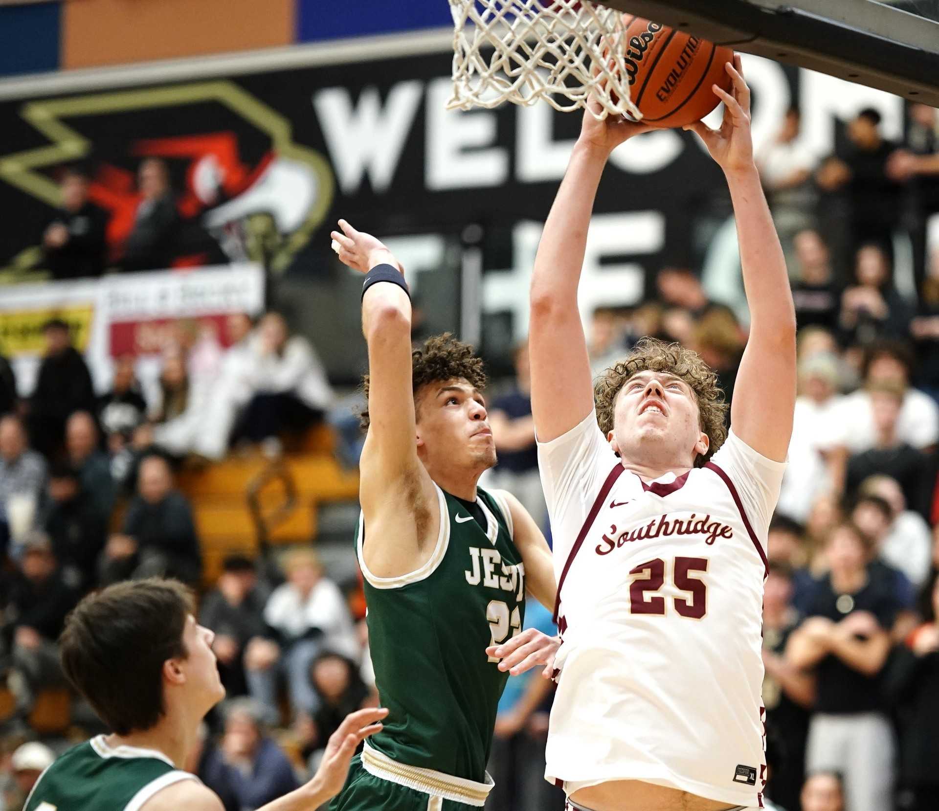 Southridge's Ryder Zanon goes up for a dunk in the fourth quarter of Tuesday's home win over Jesuit. (Photo by JR Olson)