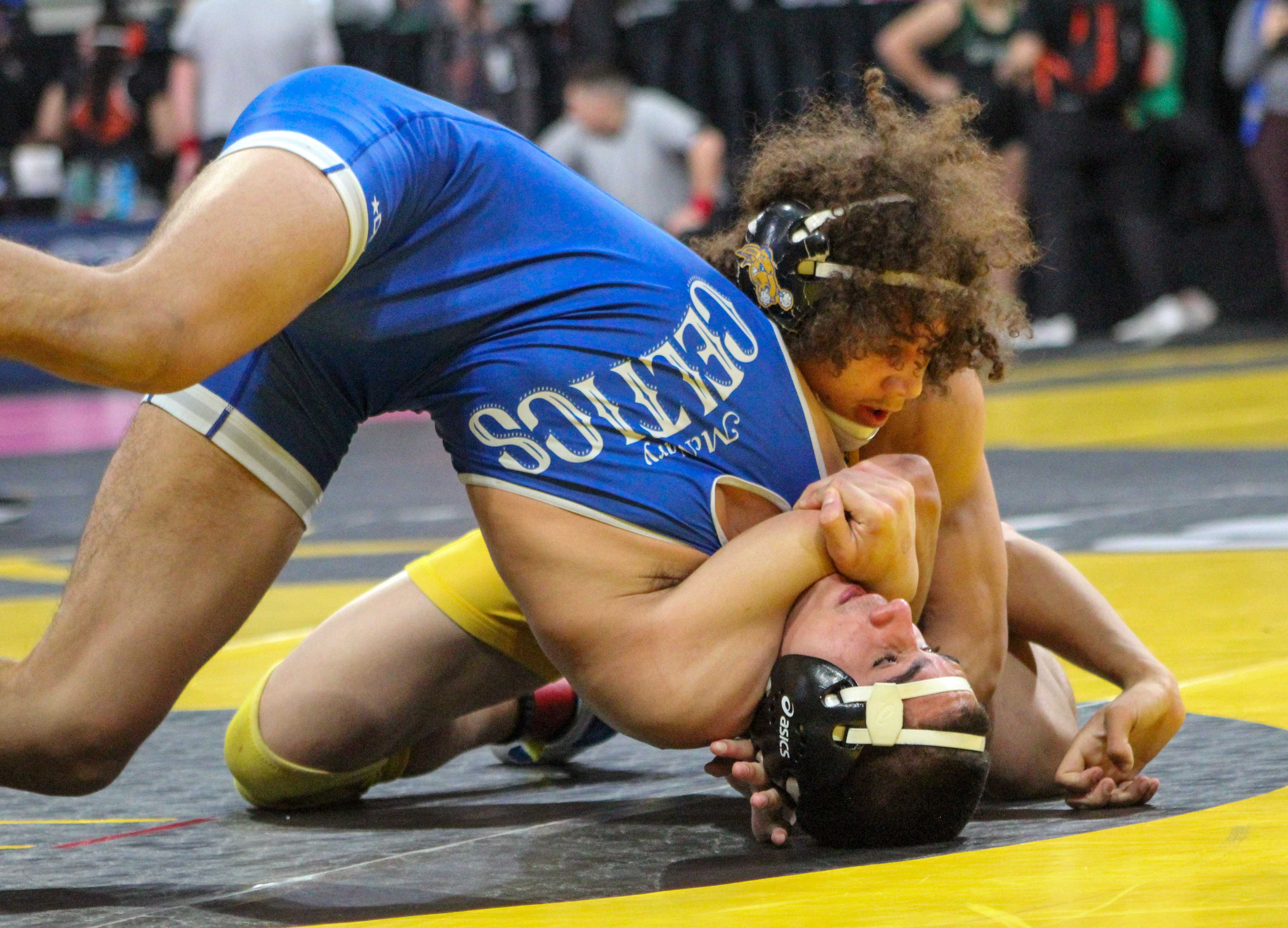 Jefferson's Titus Rodela looks for a pin in the 2025 state wrestling tournament. (Photo by Austin White)