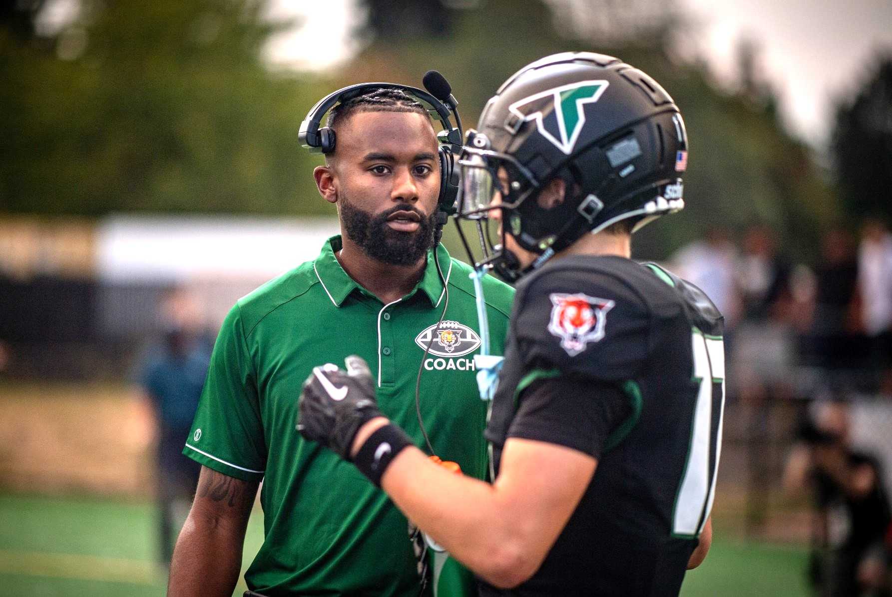 Will Whitley joined Tigard's staff last year and served as passing game coordinator and receivers coach. (Photo by Ralph Greene)