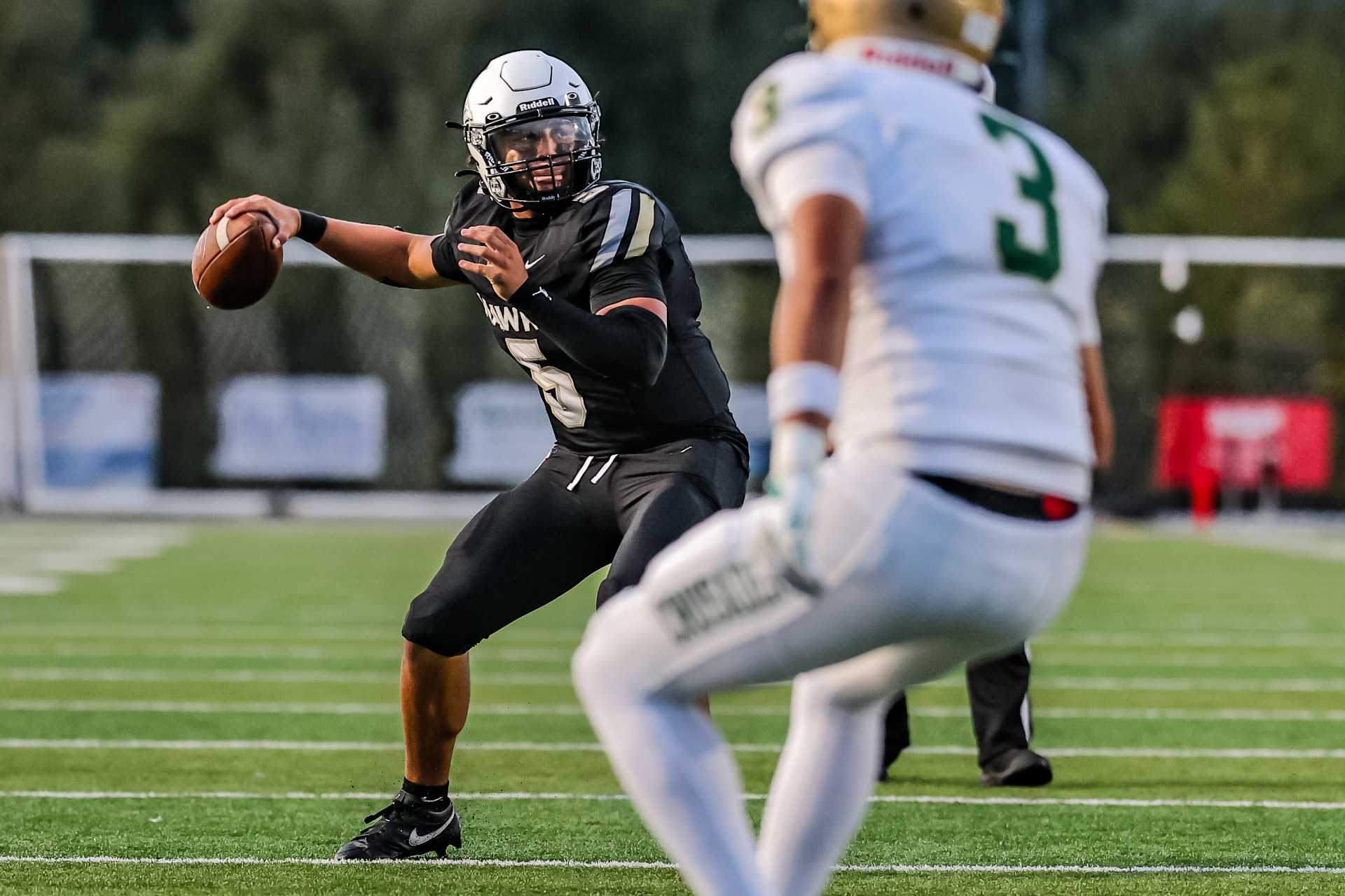 Nelson senior quarterback Braylon Gaines threw five touchdown passes in Friday's win over Jesuit. (Photo by Ryan Fanger)